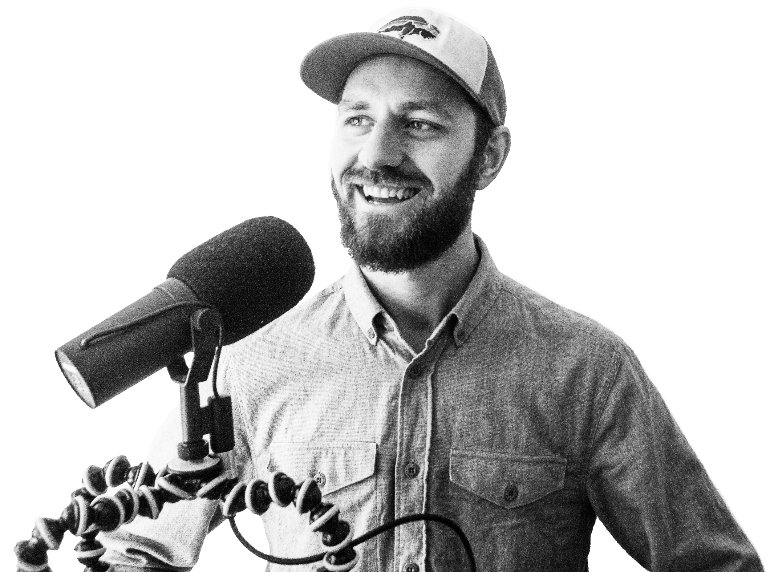 Jeremy Enns speaking into a podcast microphone