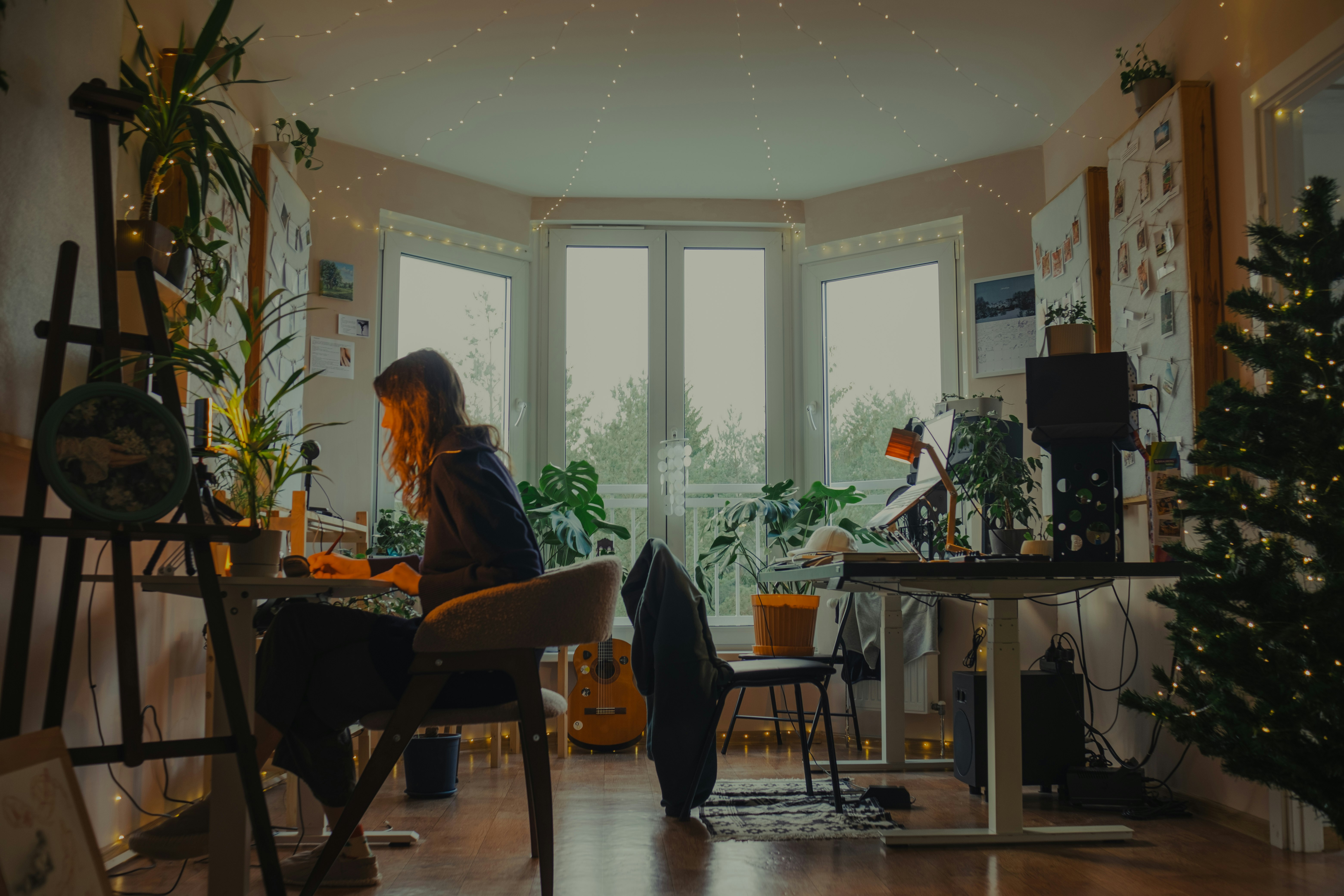 Parent working at a desk at home